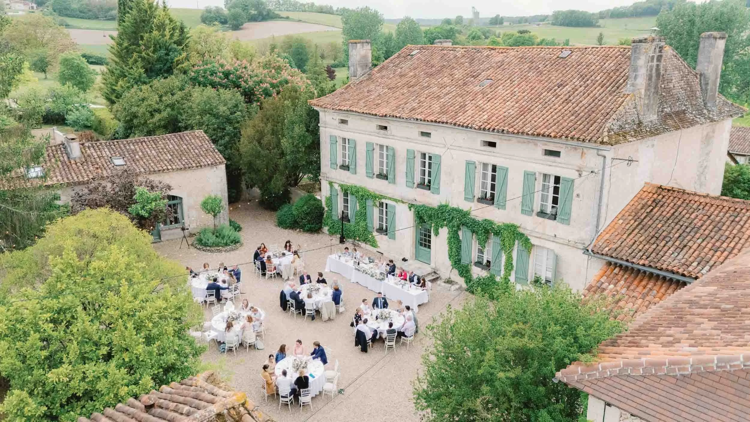 Aerial drone photograph of a wedding reception at Manoir de Longeveau, Charente