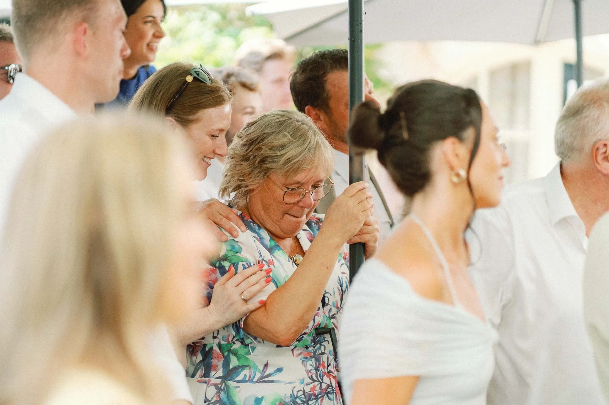 Mother of the groom emotional during the wedding at Château du Raysse, Dordogne