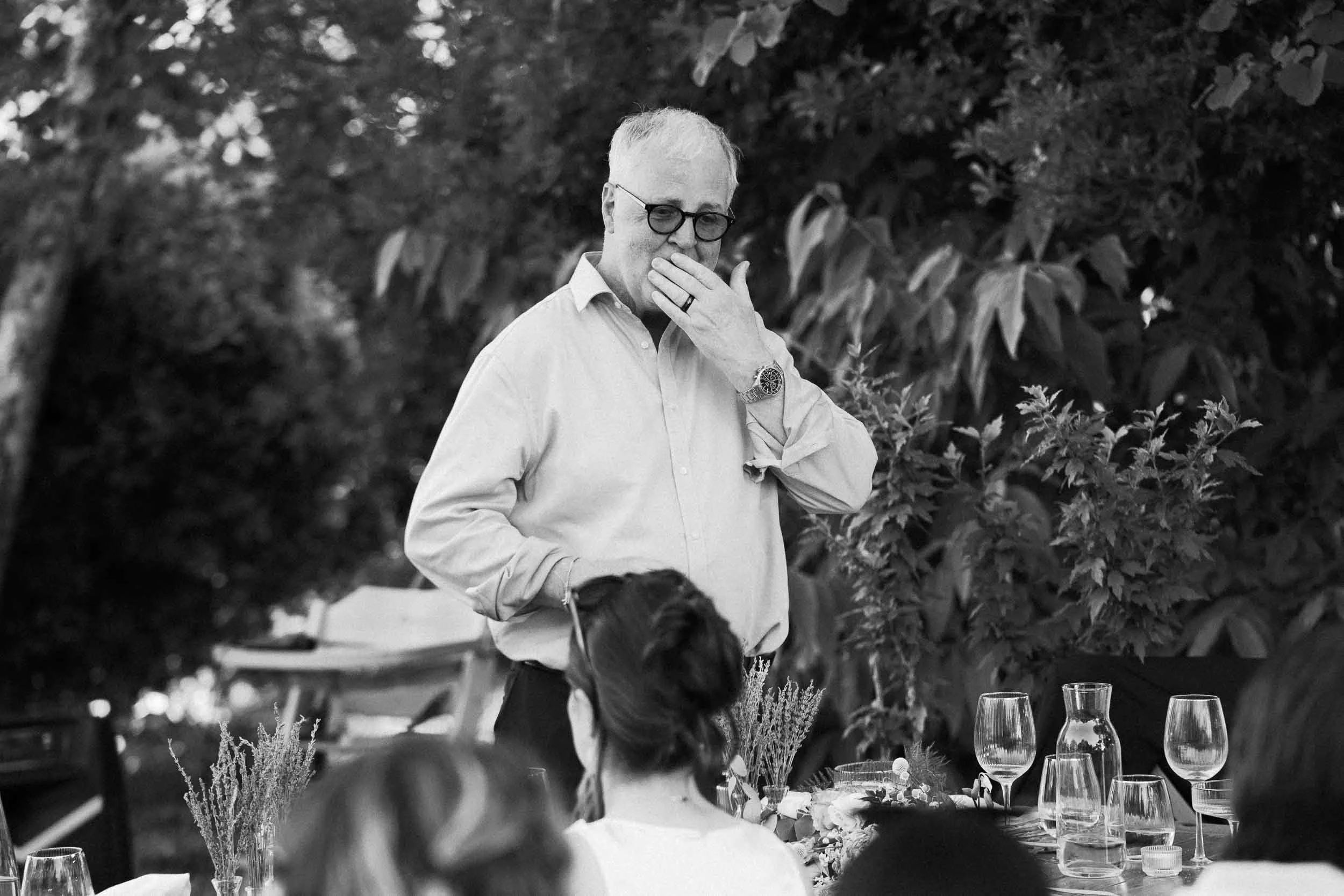 Black and white photograph of the father of the bride during his speech at Château de Panisseau, Dordogne