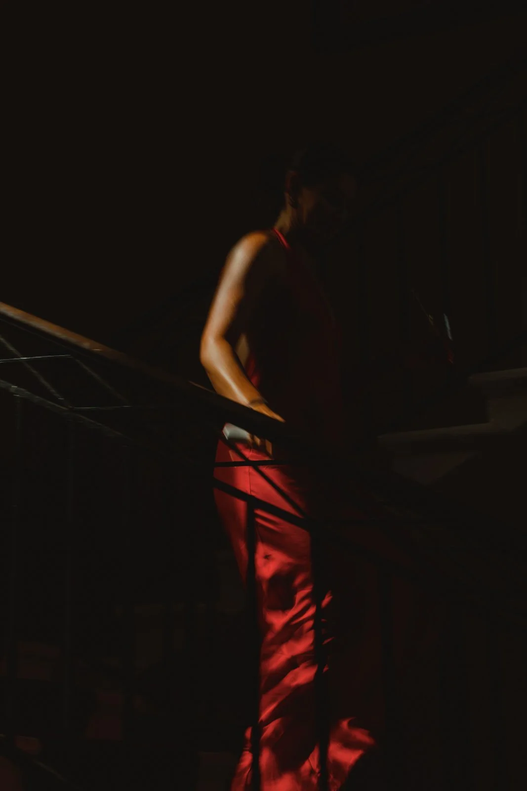 Silhouette of a guest in a red dress at Château Lagorce, Bordeaux