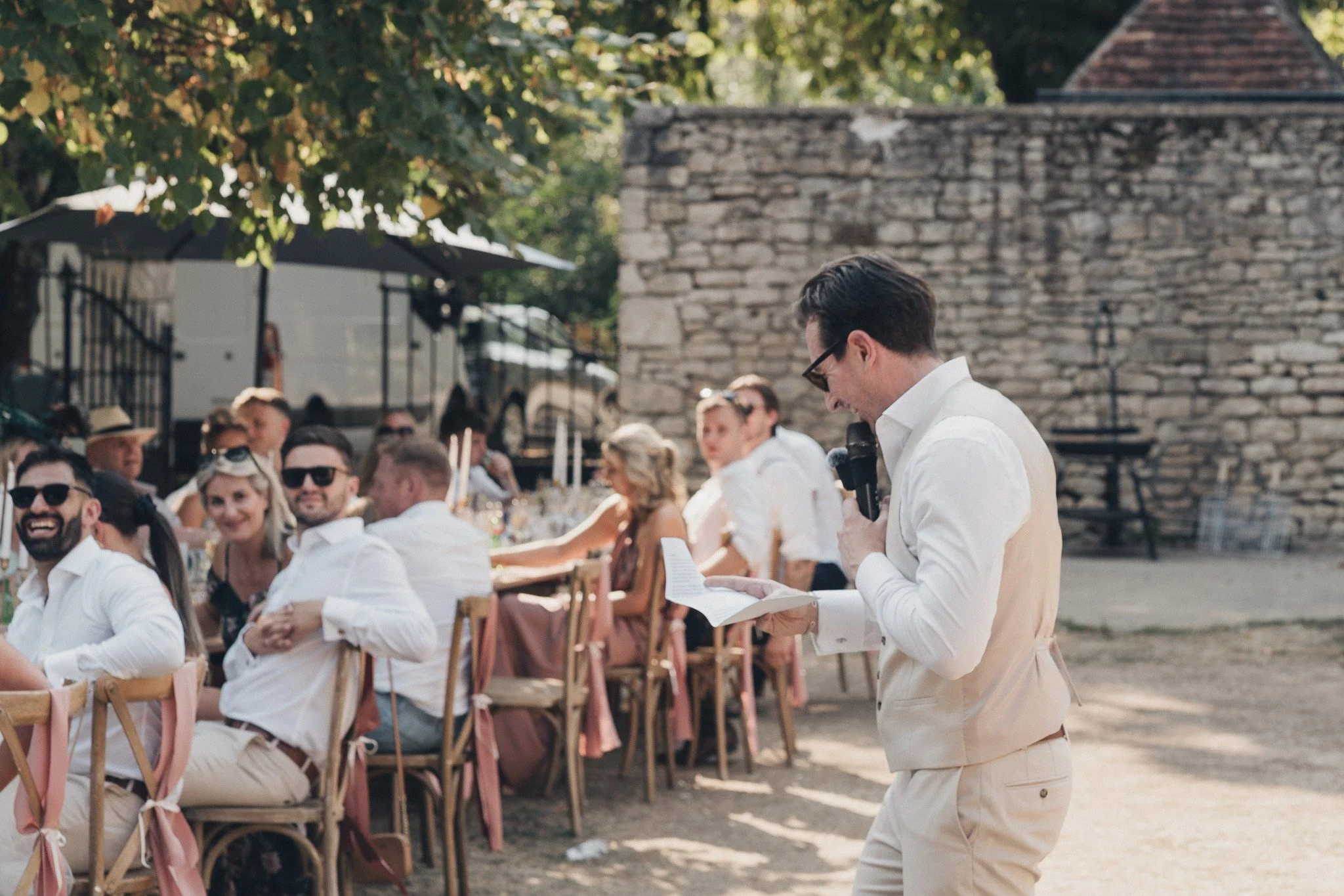Groom giving his wedding speech during the outdoor reception.