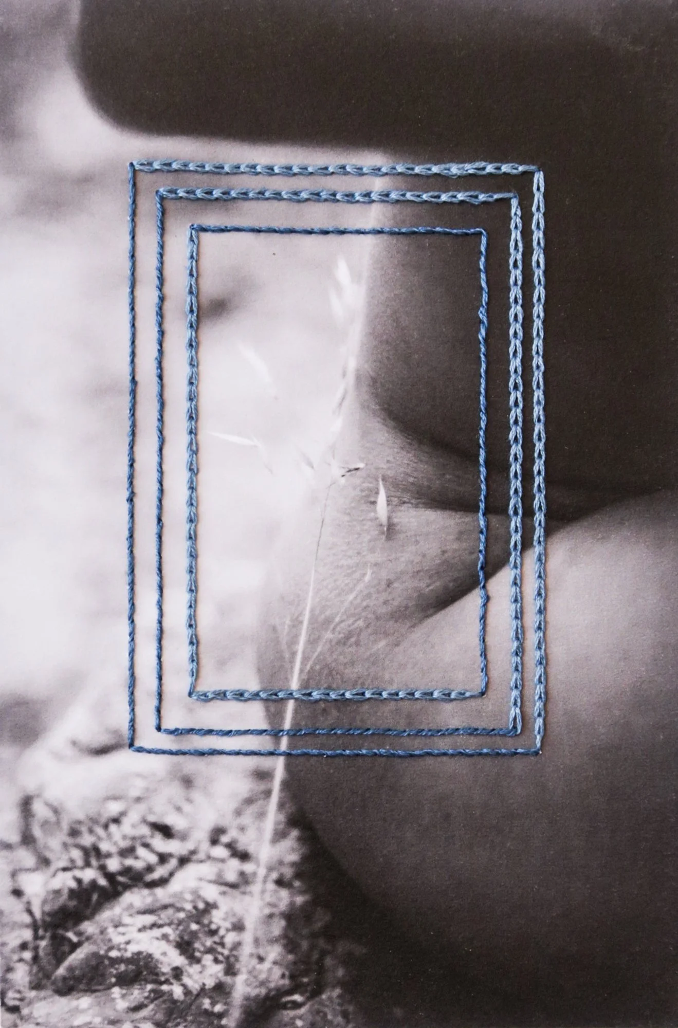 A photograph combining nude body, thread, and nature, photo embroidery on paper by Yanina Shevchenko, an artwork from her project We Are One