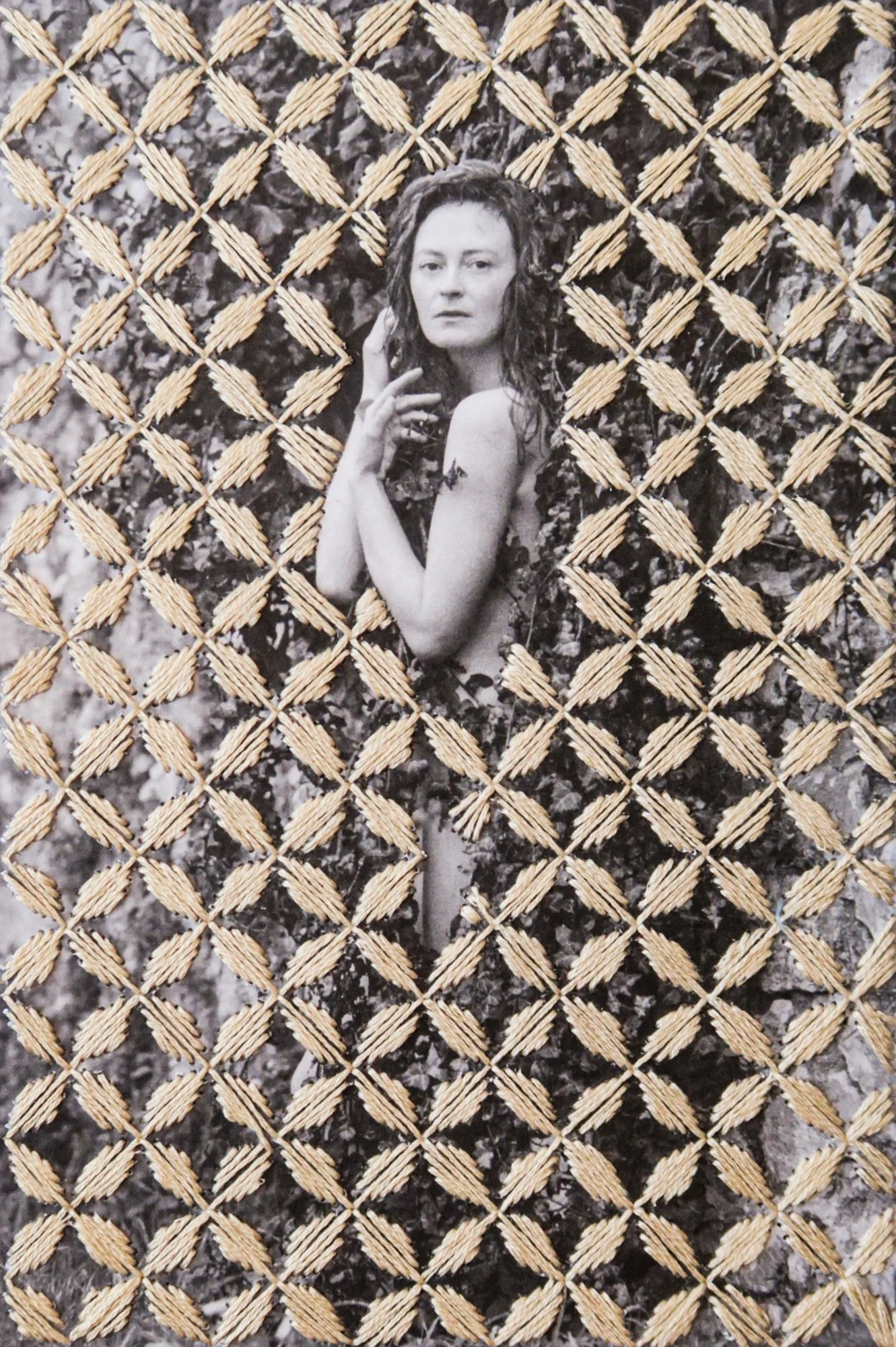 A photograph combining nude body, thread, and nature, photo embroidery on paper by Yanina Shevchenko, an artwork from her project We Are One