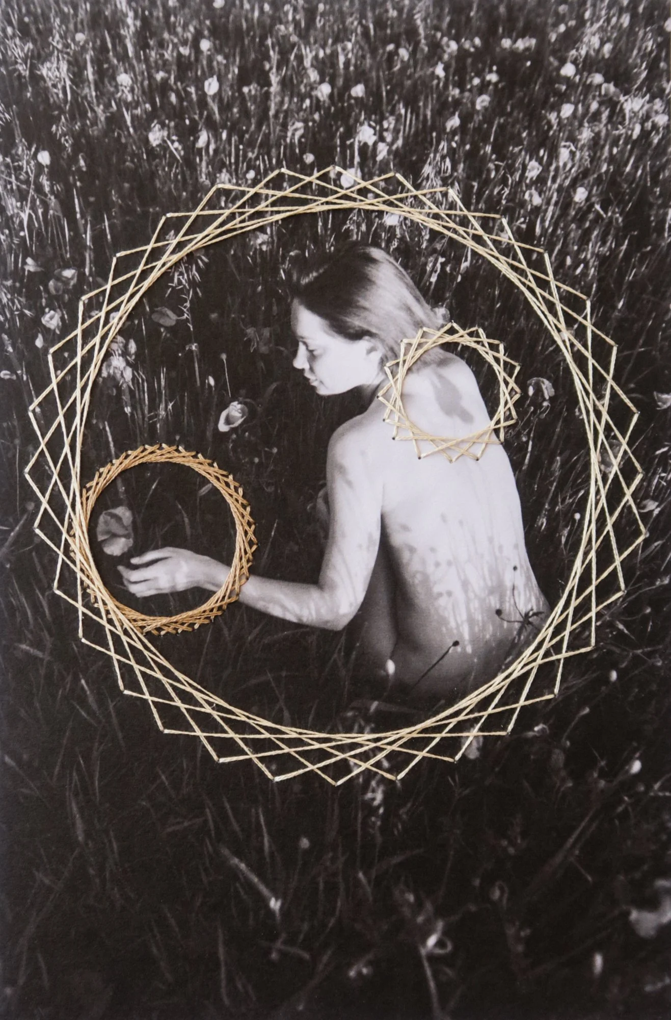 A photograph combining nude body, thread, and nature, photo embroidery on paper by Yanina Shevchenko, an artwork from her project We Are One