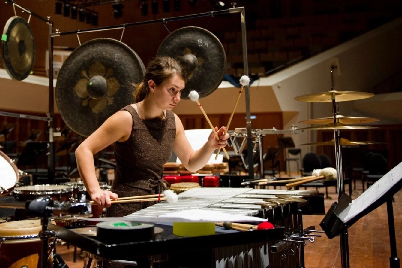 Vassilena Serafimova playing a setup piece during the final of the Tromp Percussion Eindhoven 2010 competition with various percussion instruments including vibraphone, drums, gongs and cymbals