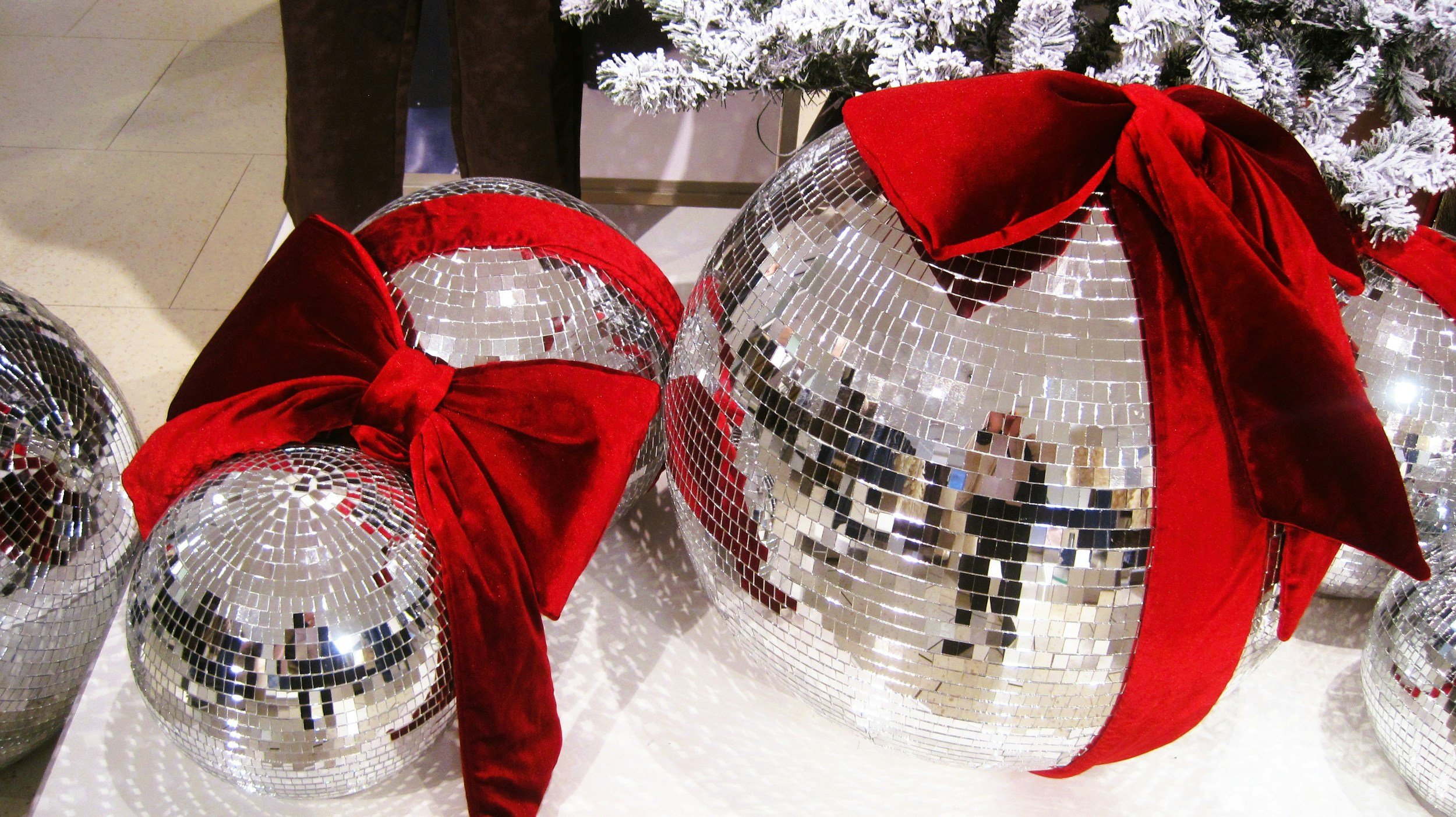 Brand-led Christmas window display in a retail store