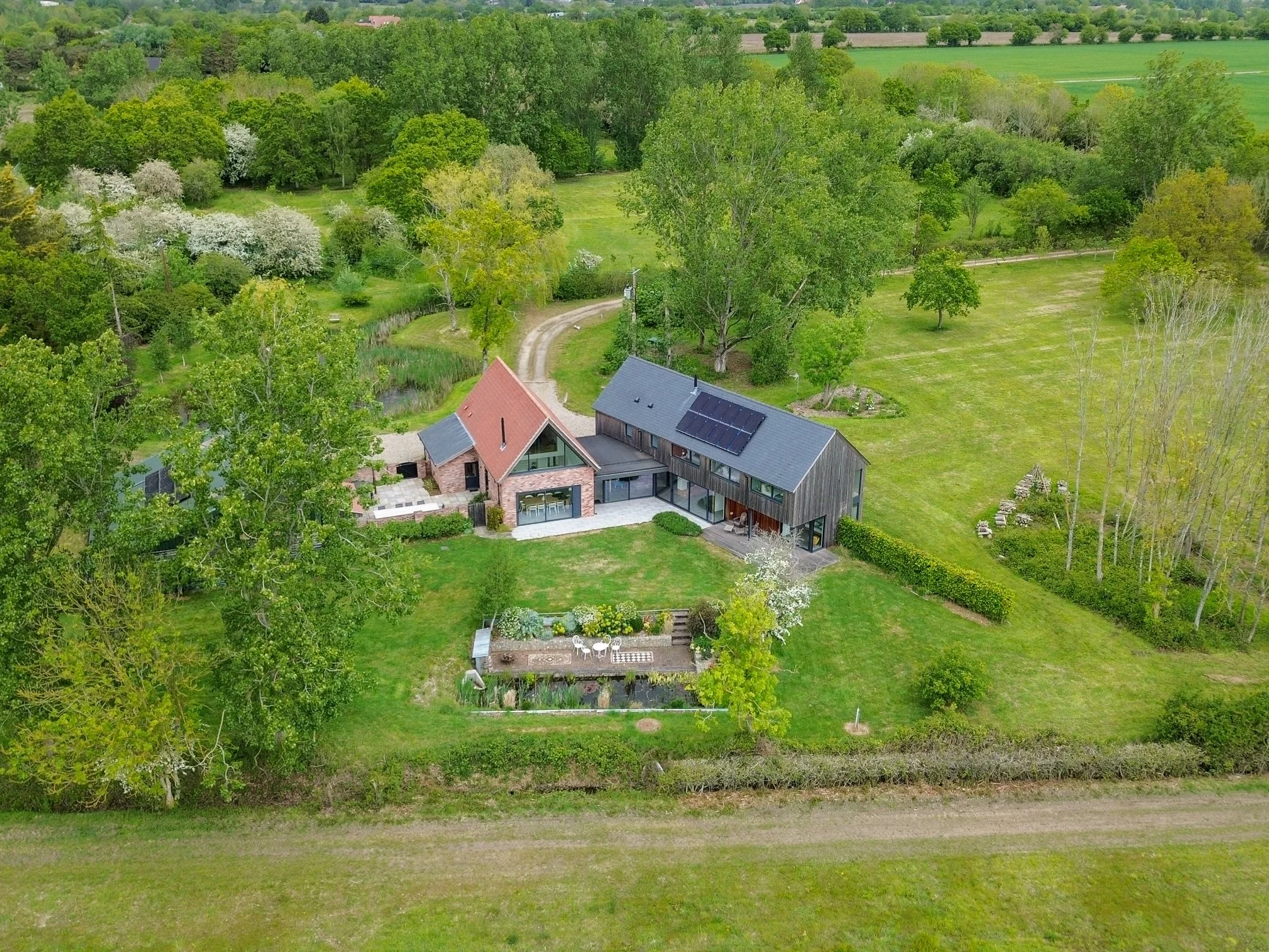 The Chatterbox, Waterloo Farm, Suffolk - Rear Aerial View.jpg