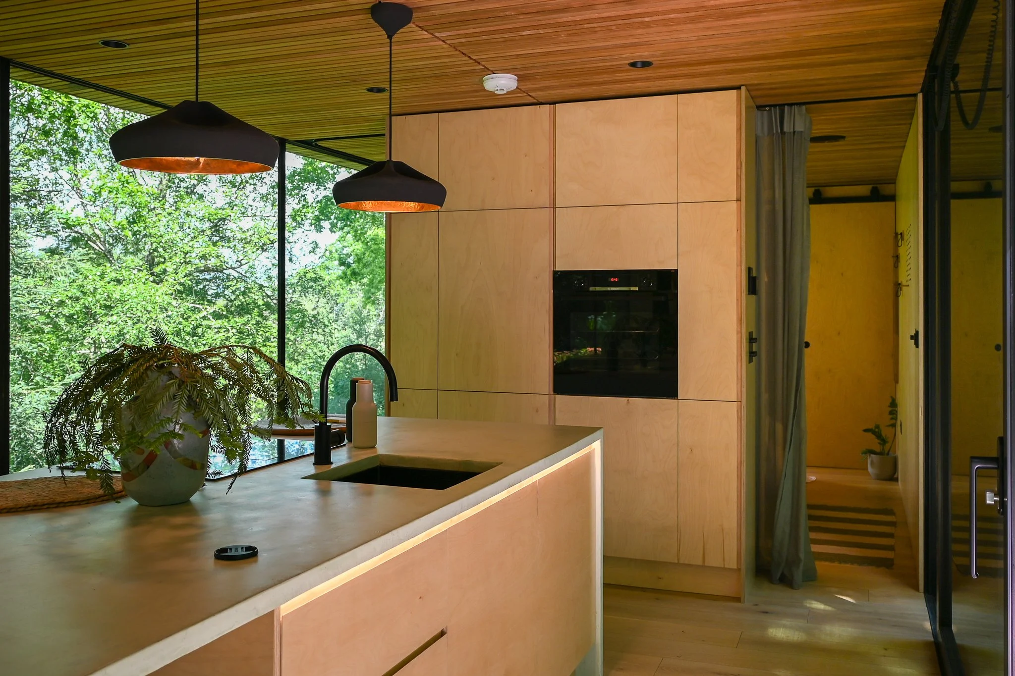 Looking Glass Lodge Kitchen View With Kitchen Island and Wall Cupboards
