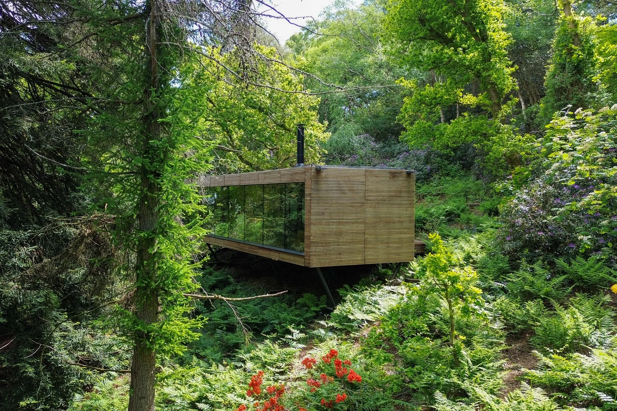Looking Glass Lodge Side Elevation Aerial Shot Within the Woods