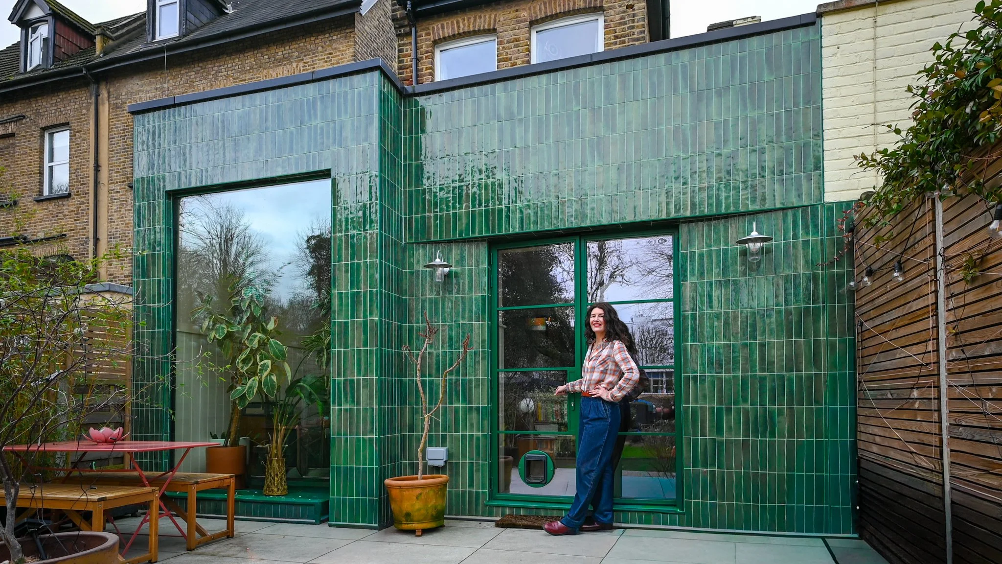 Patsy and her green-tiled modern rear extension in Muswell Hill, North London.