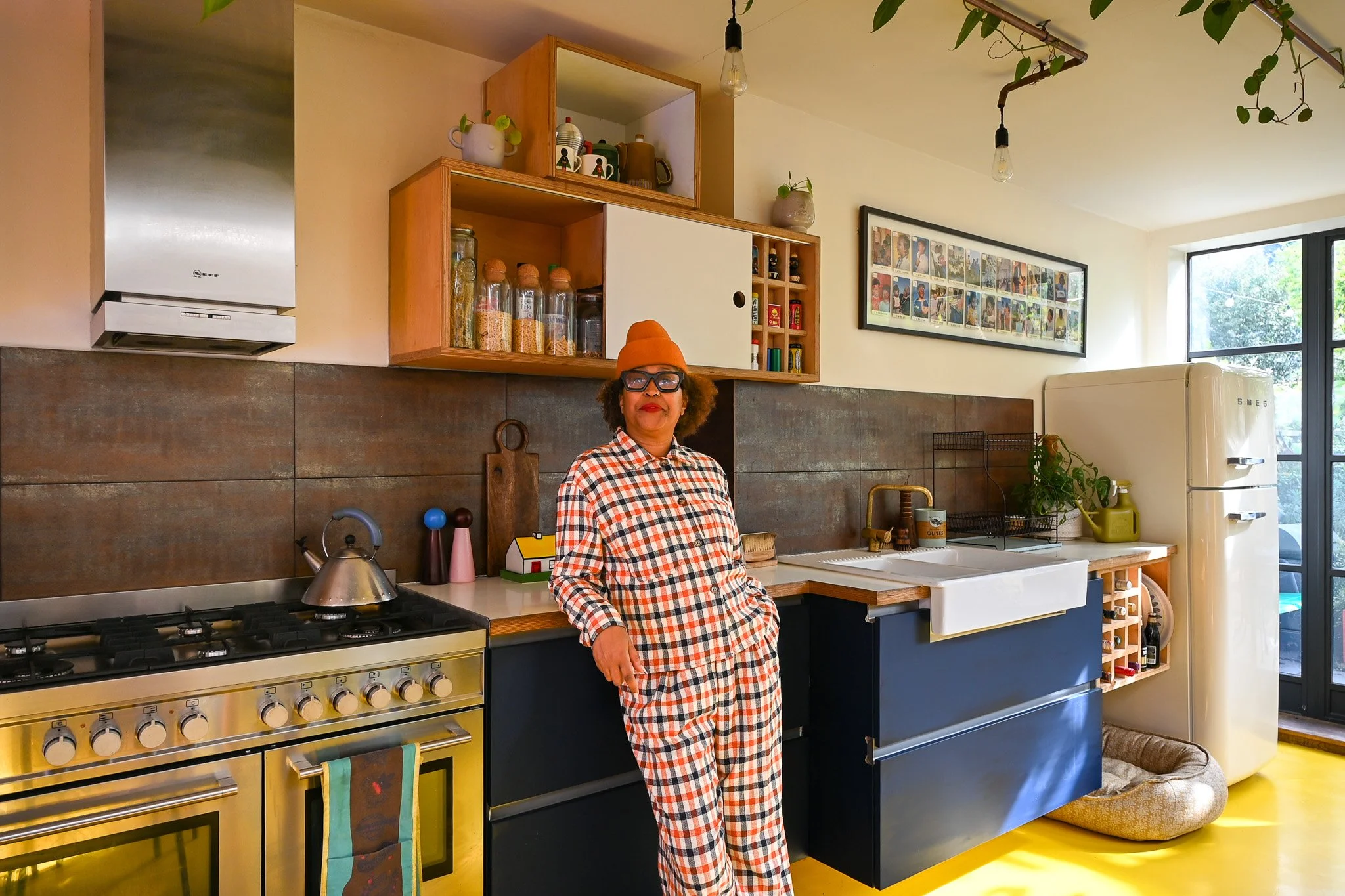 women leaning on a kitchen worktop