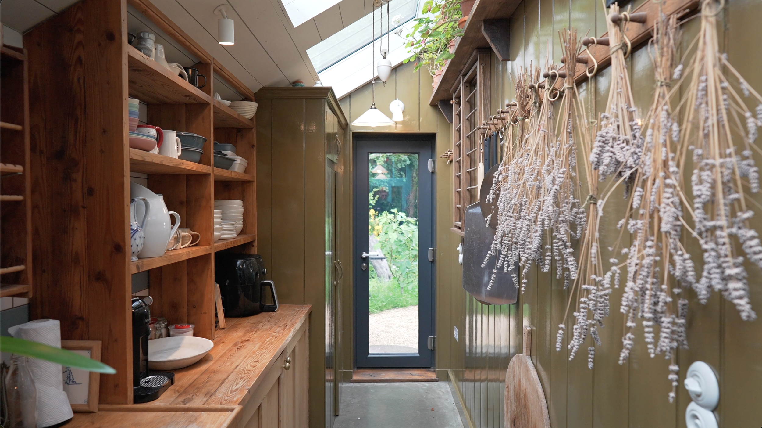 pantry shot looking out into the garden with a polished concrete floor