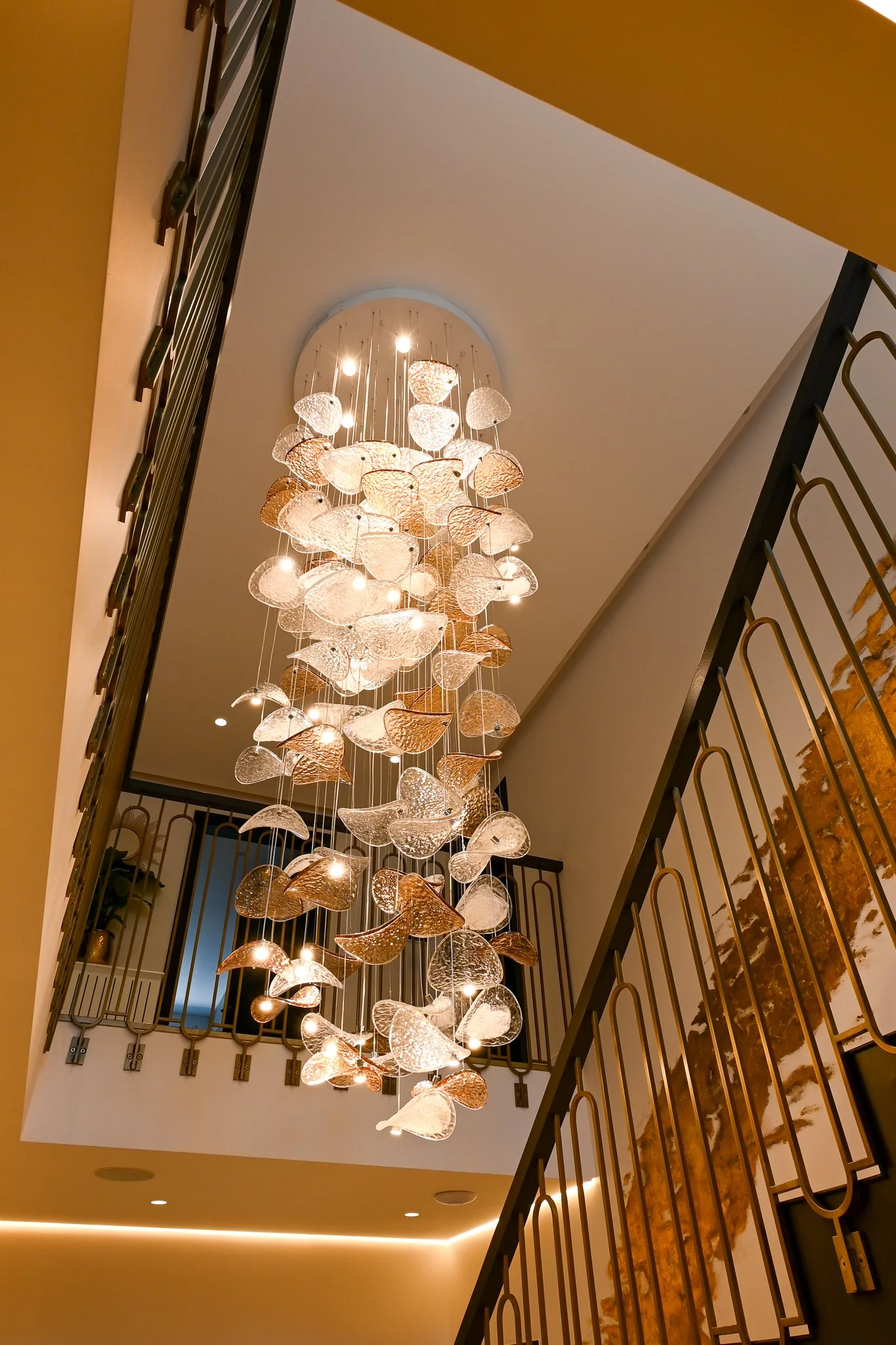 large hanging light in atrium entrance hallway