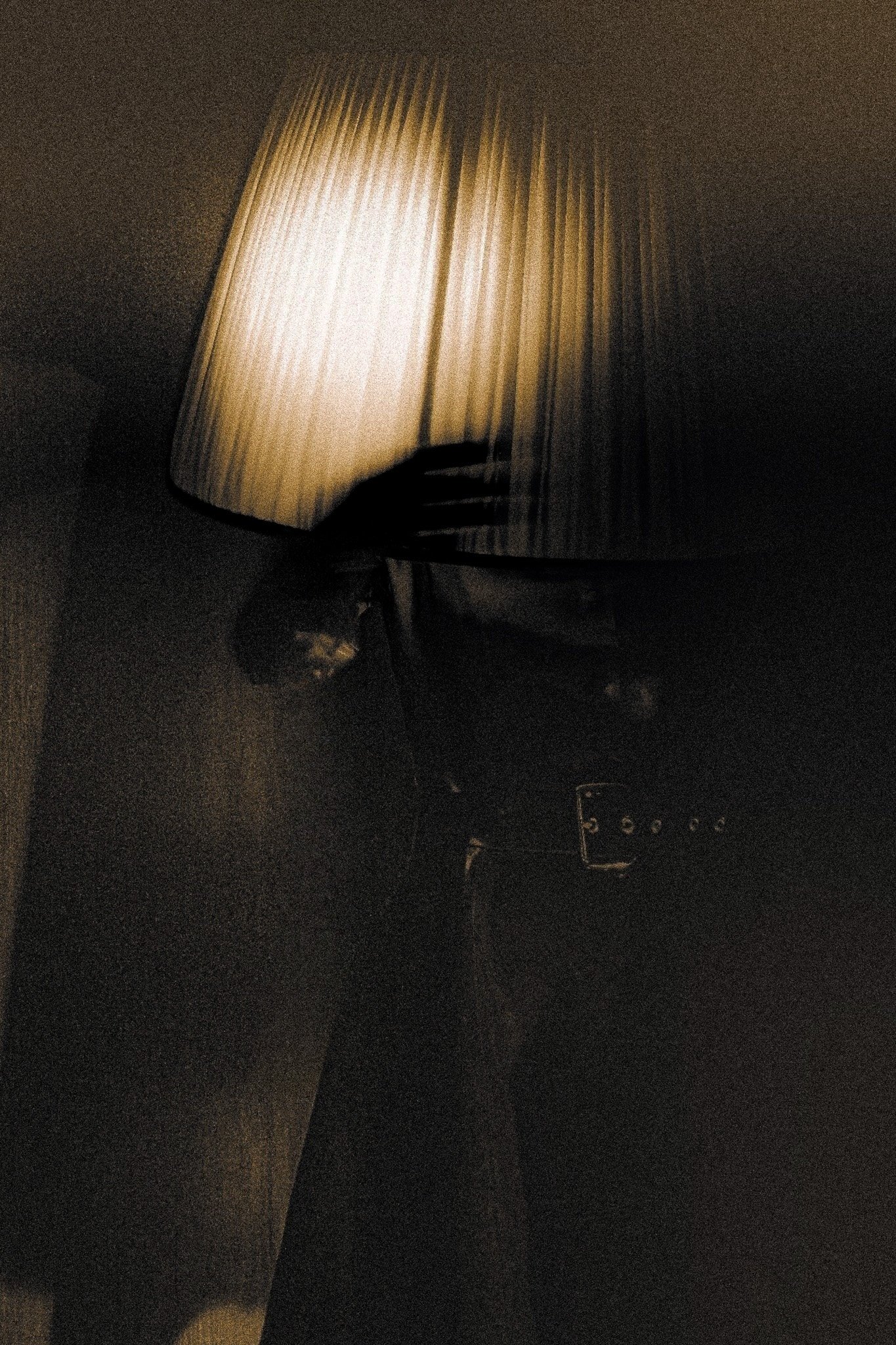 She turned, and the light pulled tighter