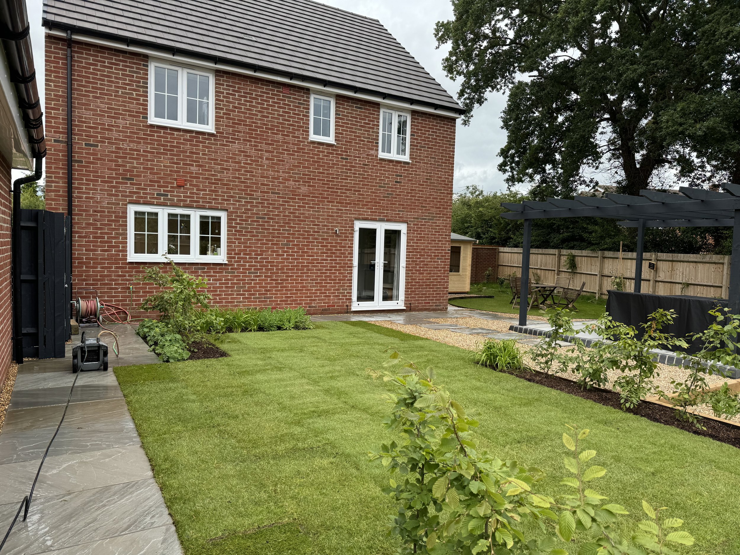 The rectangular lawn with hedging