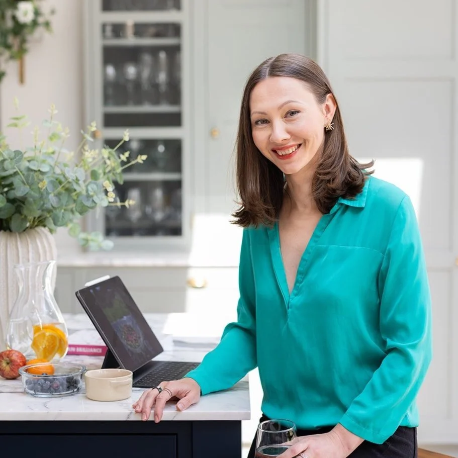 UK nutritional Therapist, Irina Wolf in kitchen with healthy snacks