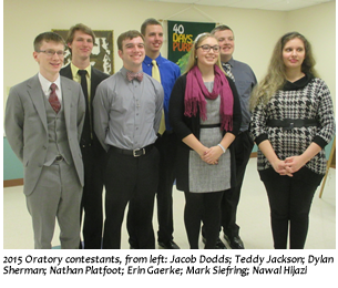 Shelby County Right to Life Oratory Contest; Seven young adults standing together indoors at a formal event, smiling at the camera.