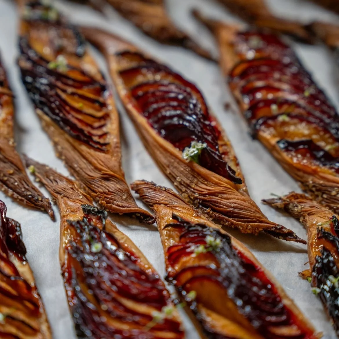 @farm.one popup and pastry collab with @ying_a_ting. End of season plum croissants, herbs, greens, alyssum flowers and more! Beautiful photos from @micheleilluzziphoto
