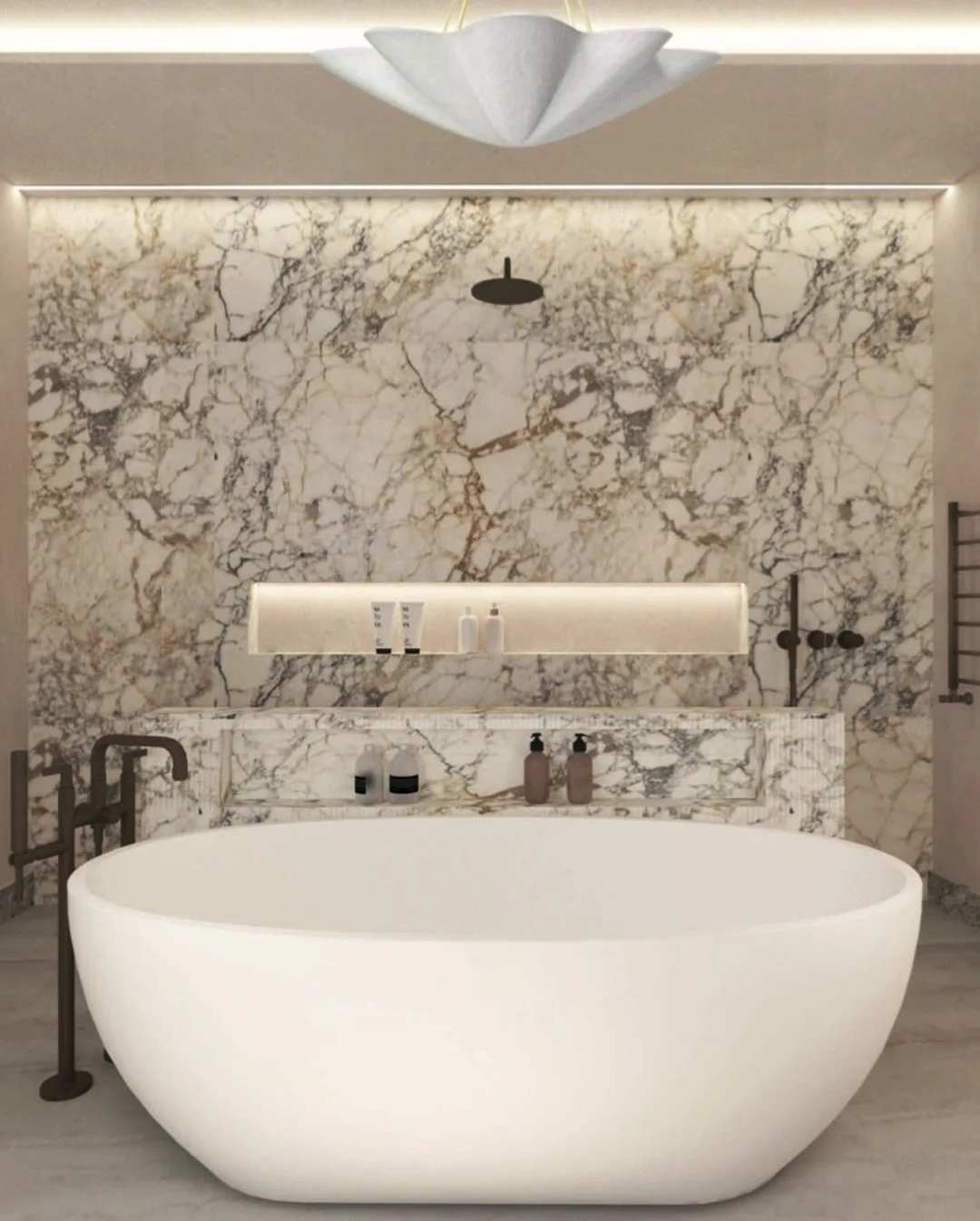 The master bathroom - a space I&rsquo;ve designed for calm and self-care in a villa I&rsquo;m currently working on in Tuscany. ✨

A sculptural standalone bath sits at the heart of the room and the strong veined marble running along the back of the sh