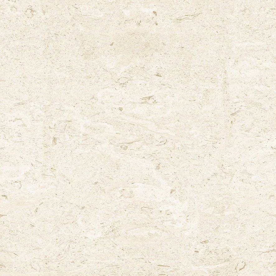 Close-up of light-colored tiled floor with large rectangular tiles.