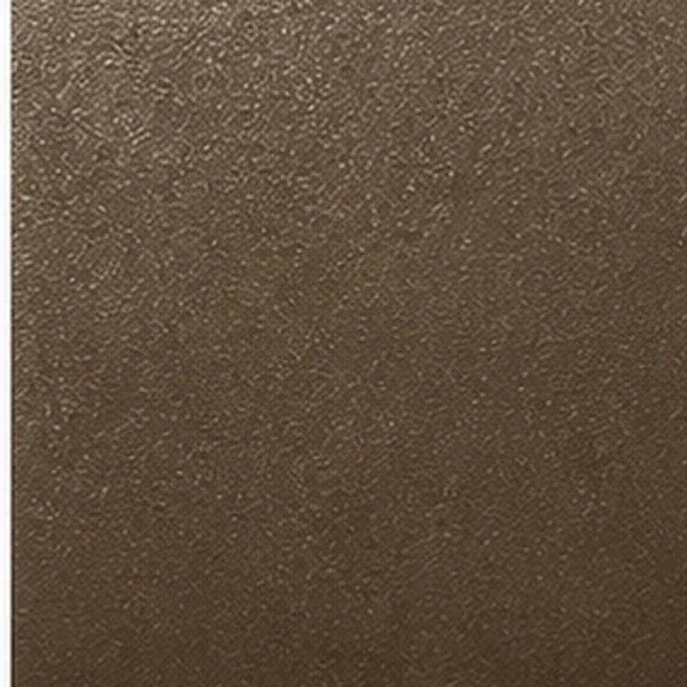 Close-up of a textured, speckled brown surface, possibly a concrete or stone material.