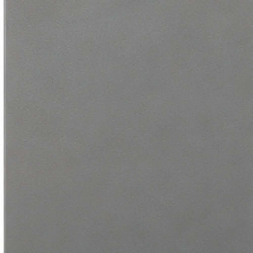 Close-up of a beige textured stone or tile surface with natural irregular patterns and slight color variations.