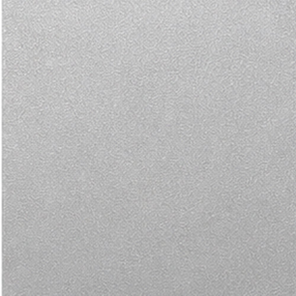 Close-up of a gray, textured stone or concrete surface.