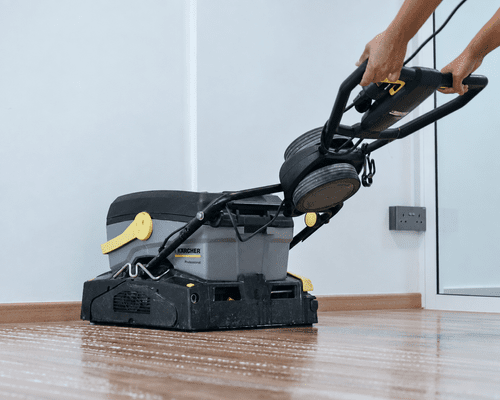 Professional machine cleaning a residential floor