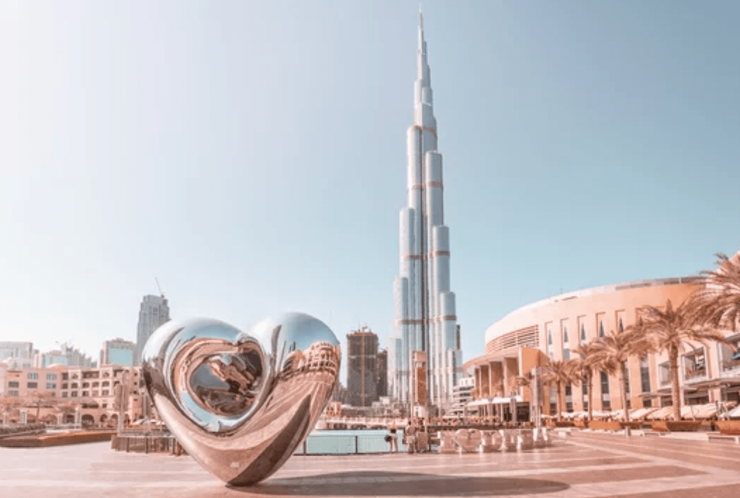 Burj Khalifa and heart sculpture in Dubai during daytime