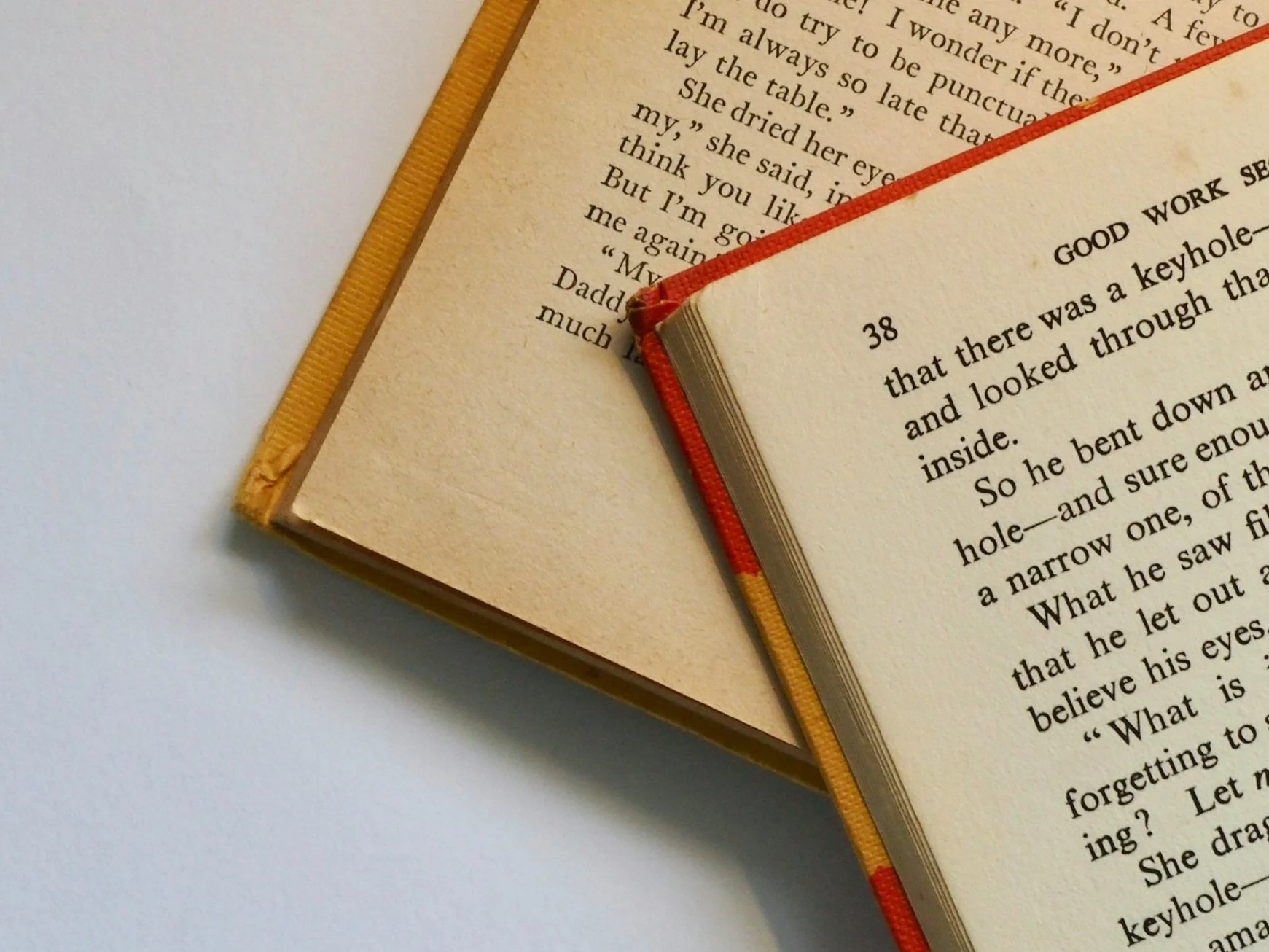 two open books on a white background