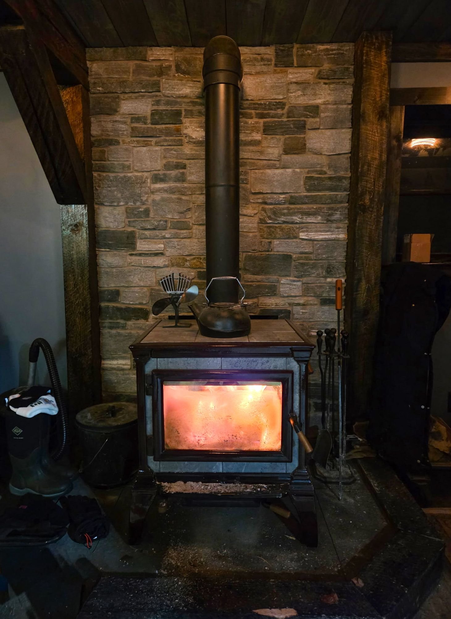 Stone fireplace surround installation in Tupper Lake, NY