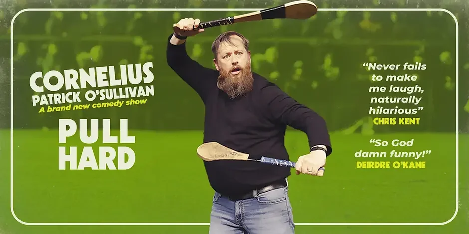Cornelius Patrick O’Sullivan presents Pull Hard, a brand-new comedy show. Promotional image shows the bearded comedian holding two hurleys against a green background, with praise from Chris Kent and Deirdre O’Kane.