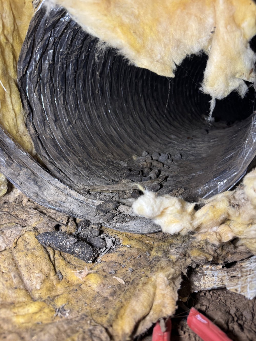 Damaged flex duct replacement in an attic by Clark HVAC