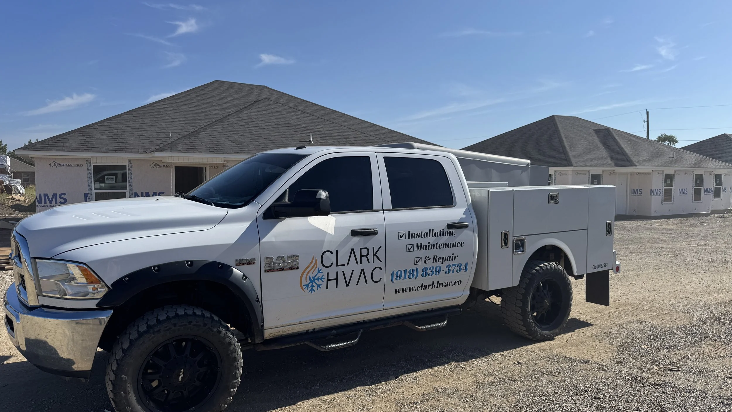 Clark HVAC service truck — family-owned air conditioning repair company serving Fort Smith AR and Poteau OK