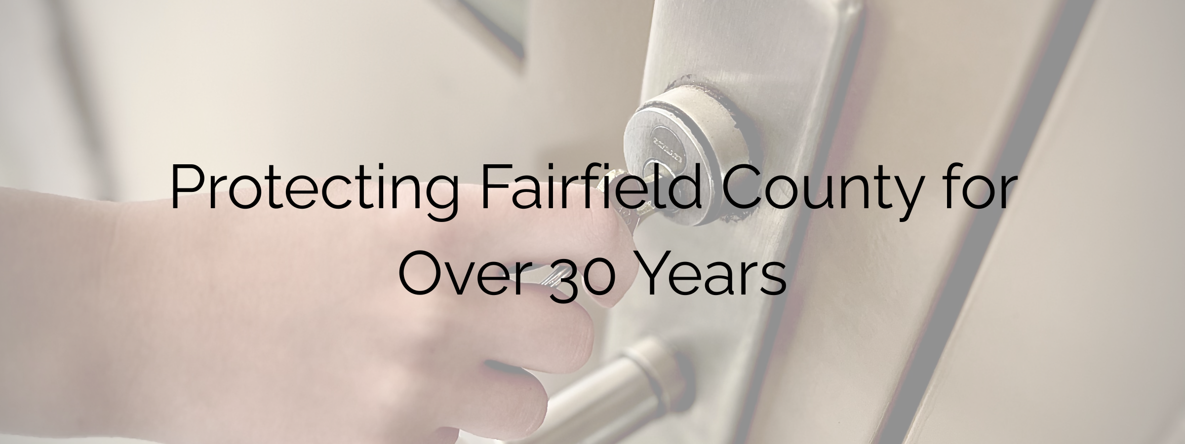 Close-up of a person turning a key in a door lock with overlaid text: 'Protecting Fairfield County for Over 30 Years'.