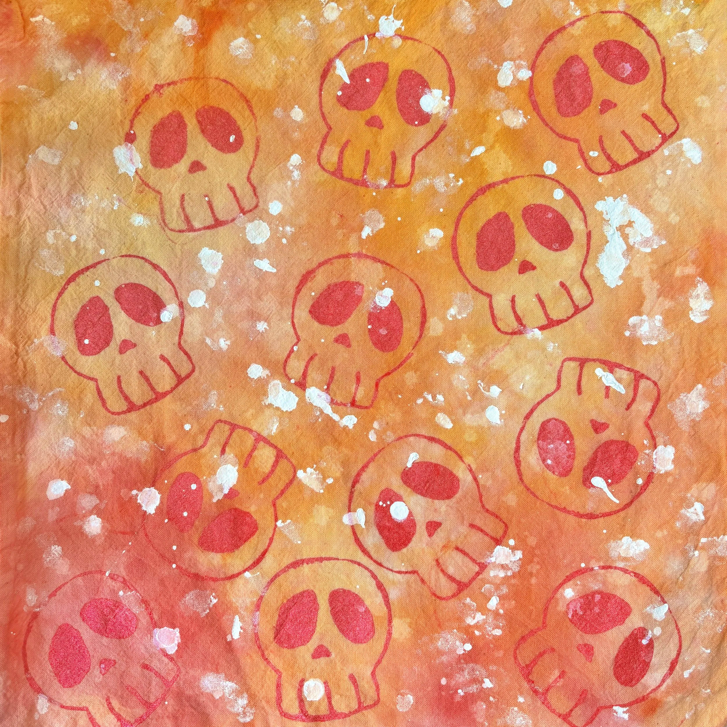 "Skulls" Marley Kidd, 2025, Screenprint on canvas tote bag, 20x20".
This tote bag is a tye dyed canvas bag with pink sparkly skulls screen printed on. Marley was in a workshop and let the tye dye take her design away, the end result emitting the sam