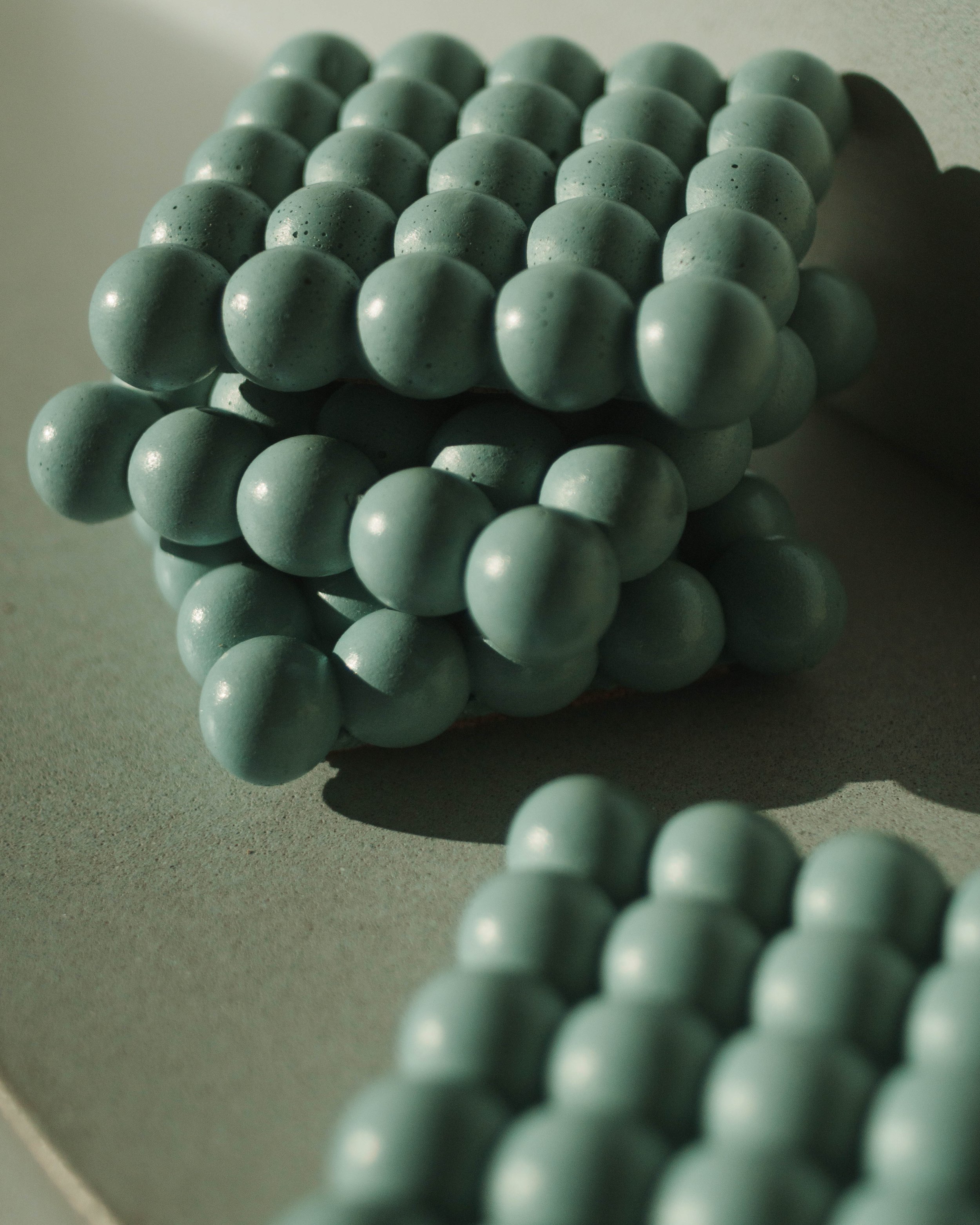 Fog Creek Concrete Bubble Coasters closeup of Mint color
