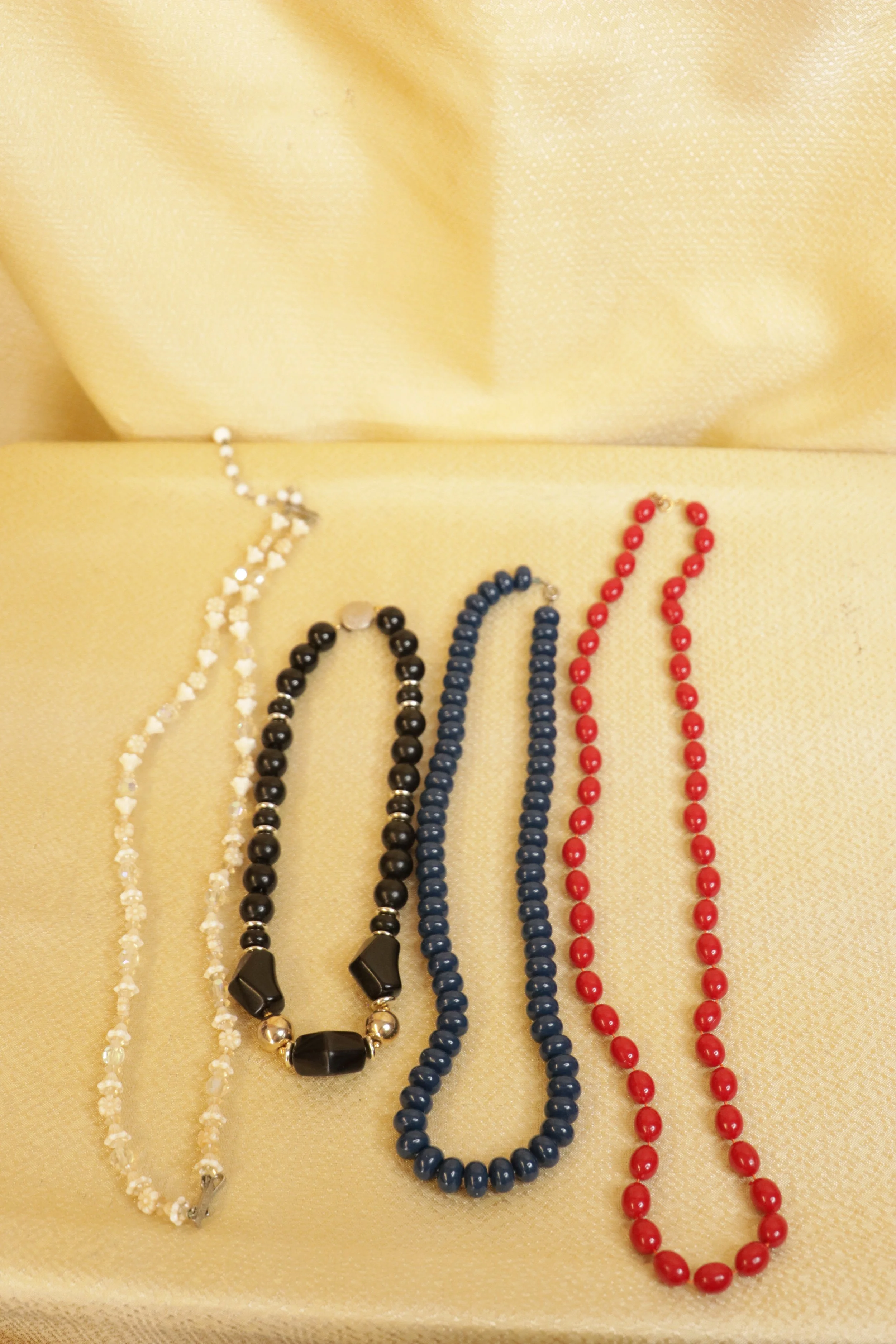 Bag of Four Necklaces