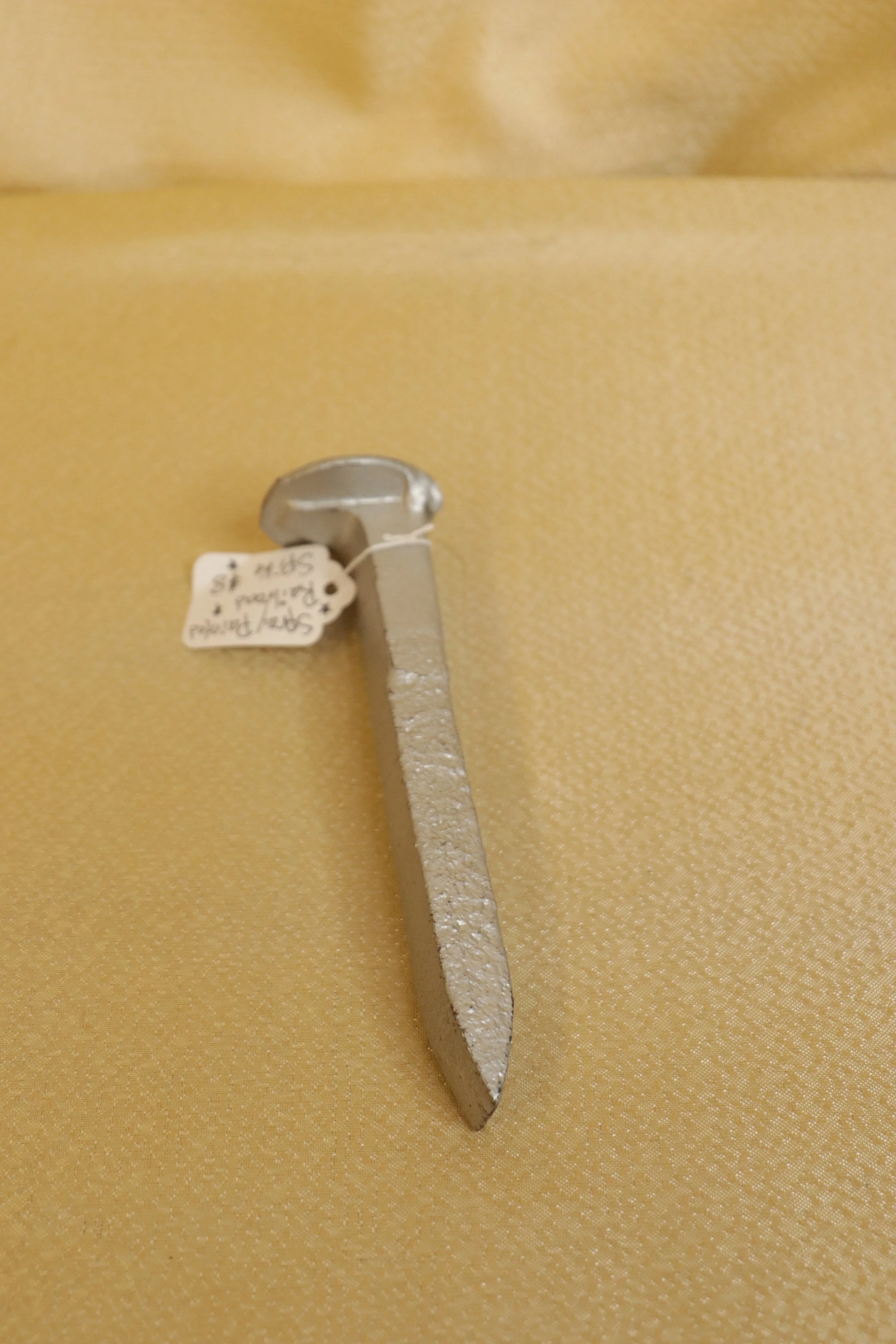 Spray Painted Railroad Spike