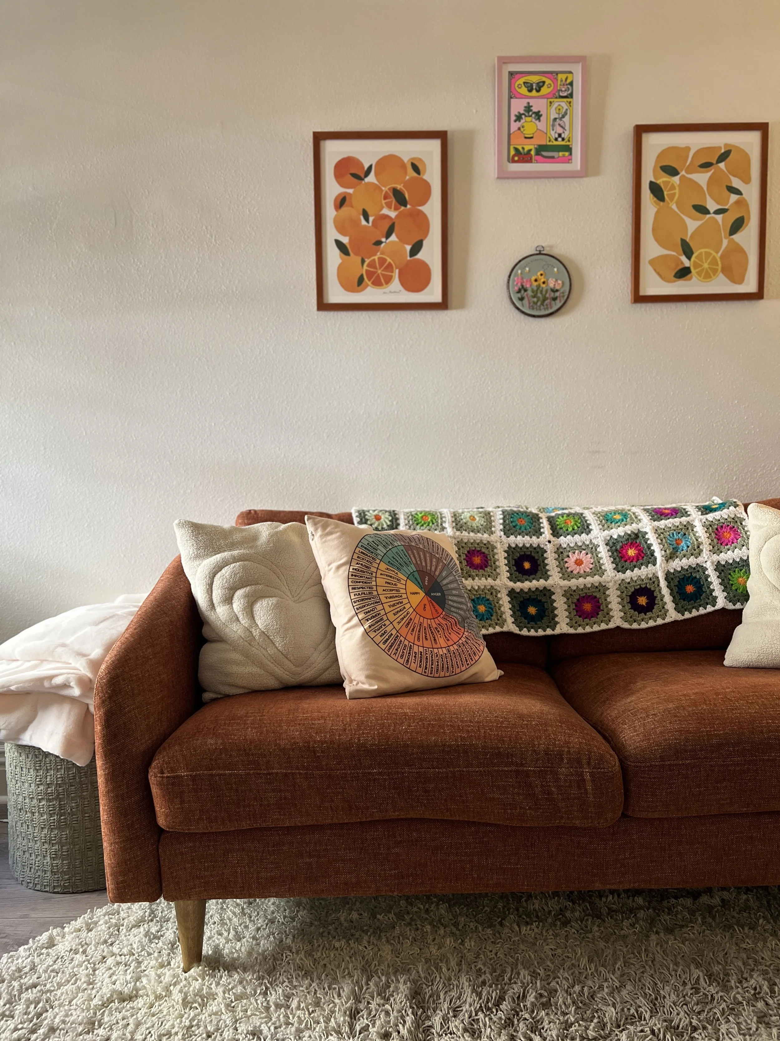 Warm and welcoming therapy office with comfortable seating at Sophia Jackson Therapy in Costa Mesa, California