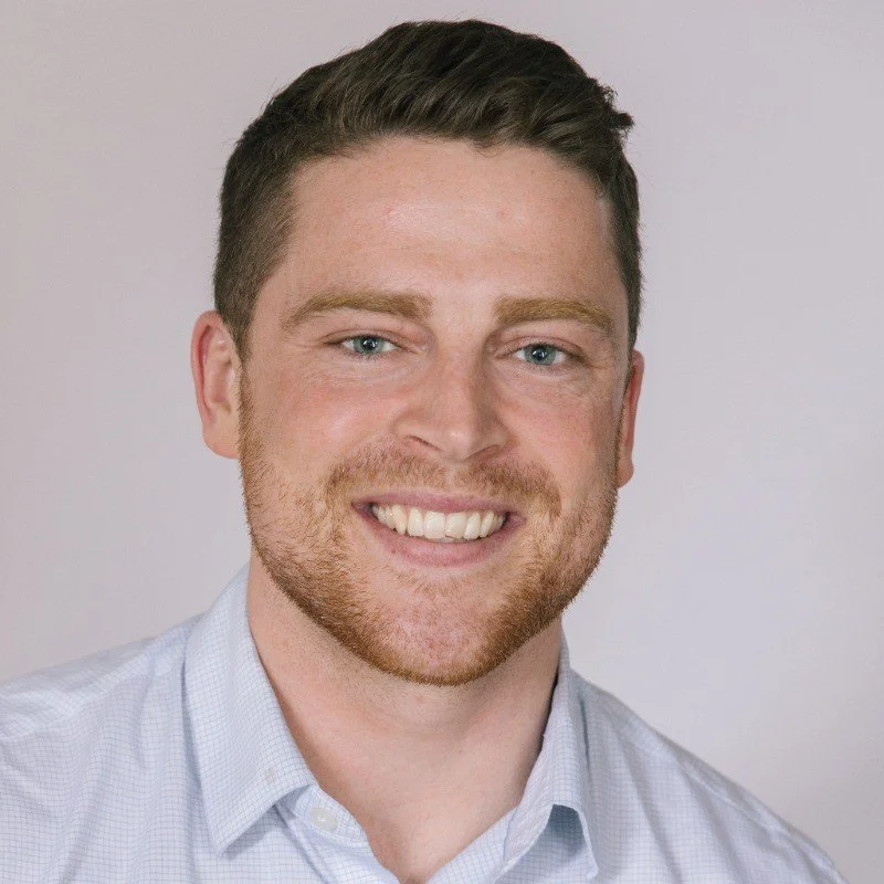 Noah Salmeri, founder of Salmeri Development LLC, with short hair wearing a light-colored shirt against a plain background.