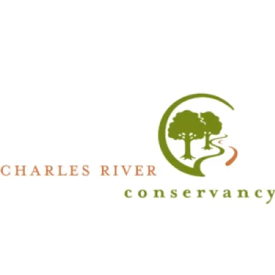 Logo for Charles River Conservancy featuring a stylized tree and river within a circular design.