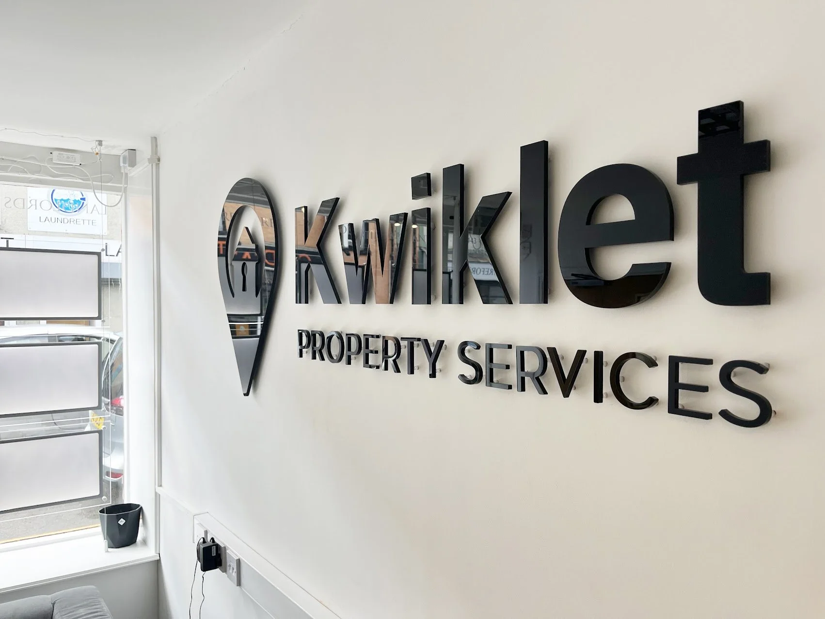 kwiklet-3d-logo-letters-black.jpg