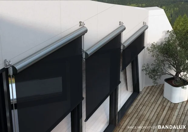 Custom fitted black o box blinds for more sun protection.