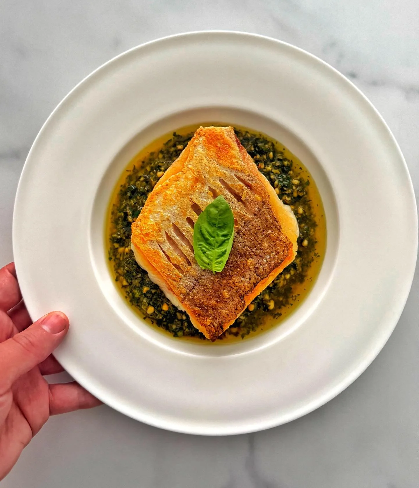 Hand cut pesto topped with pan fried hake. Fresh, fragrant - DE-LICIOUS. 

.
.
.
.
#privatechef #londonprivatedining #pesto #fish #meshutaf #catering
