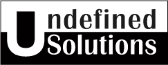 Logo with the words 'undefined Solutions' where 'undefined' is in large black text and 'Solutions' is in smaller white text on a black background.