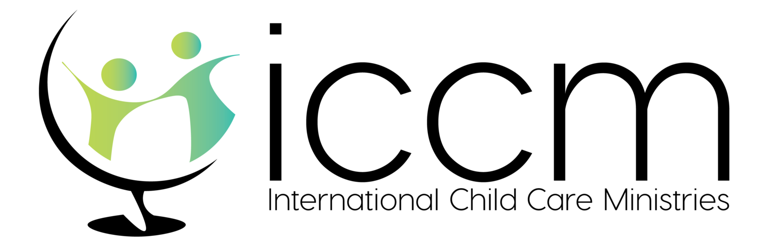 ICCM logo featuring two stylized children holding hands inside a globe, with the text 'iccm' and 'International Child Care Ministries'.