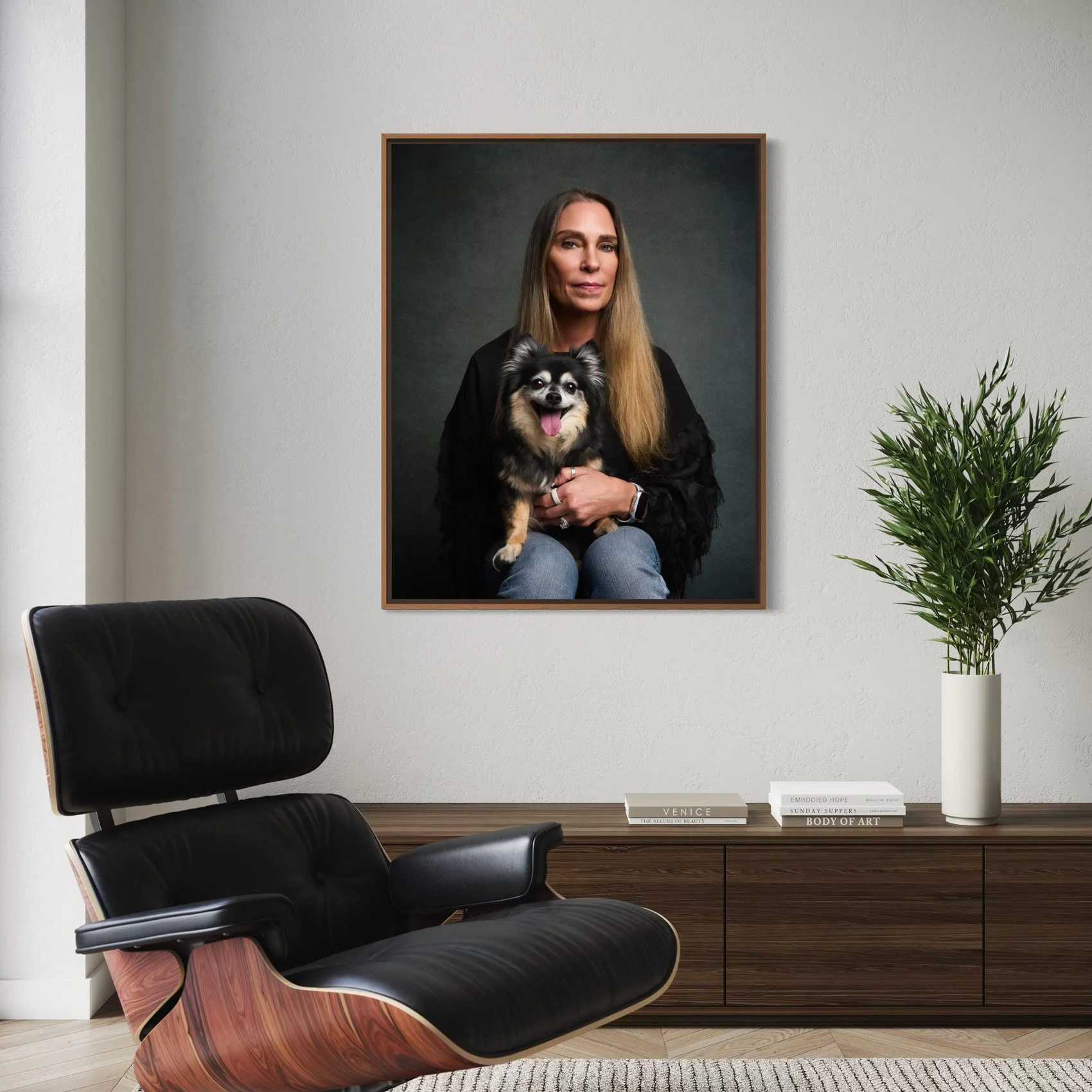 Framed studio portrait on wall.