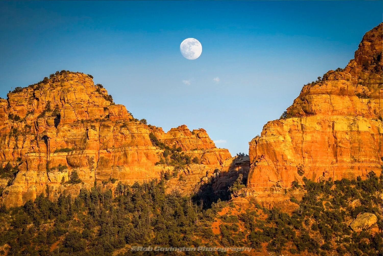 Full moon behind the Sedona mountains, by Rob Covington