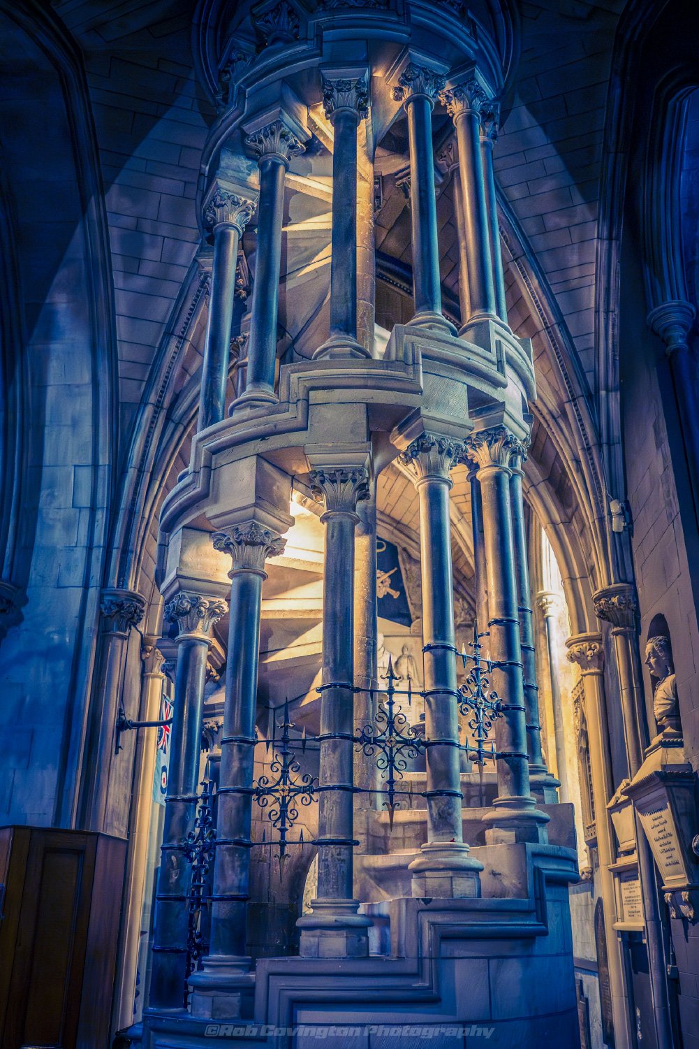 Interior low-light photography of a spiral staircase in St. Patrick's Cathedral, by Rob Covington.